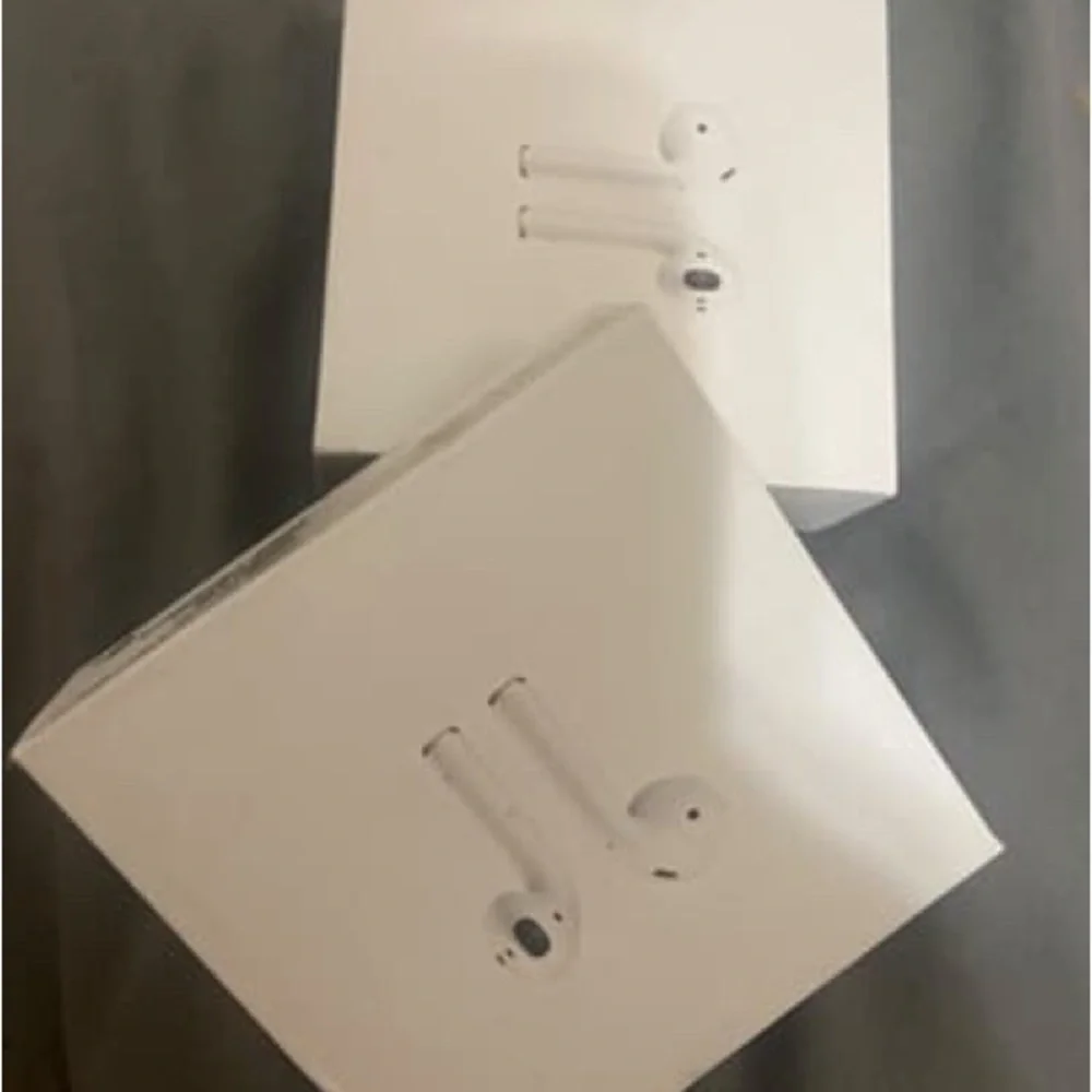 Apple Dual Wireless Earbuds with Charging Cases - White